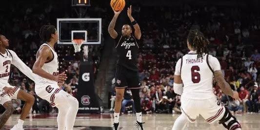 Taylor scores 25 points with 7 3-pointers to lead No. 13 Aggies to 76-72 victory over Gamecocks